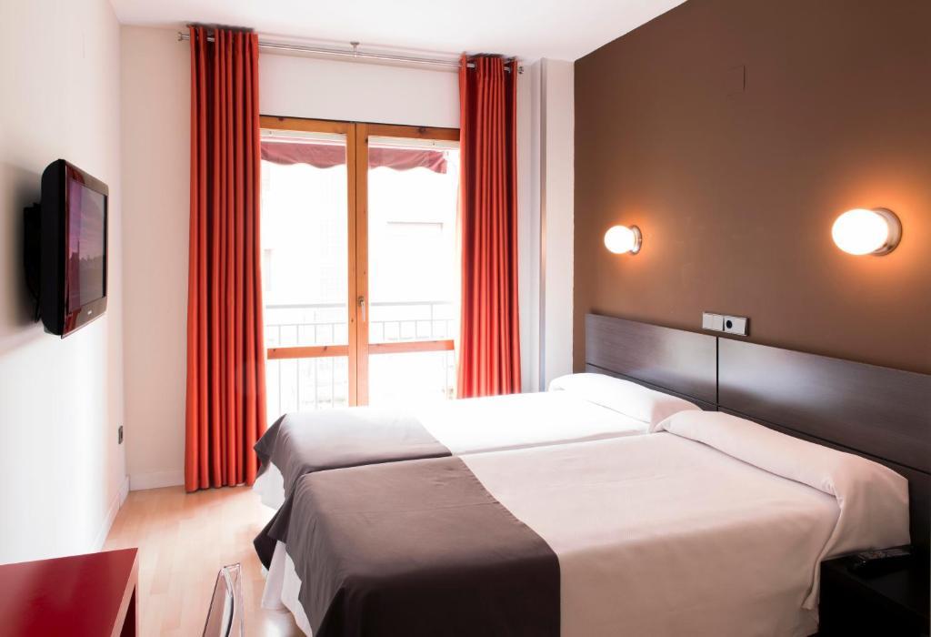 Hospedium Hostal Un Punto Chic ウエスカ 部屋 写真